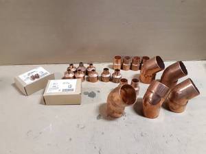 lot 744 image: Lot of Copper Reducers 1-12 down to 12, 2-12 Street Elbows, 12 x 14 Bushings and More