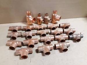 lot 750 image: Lot of (18) 1-12 x 1-14 x 1-14 Copper Reducing Tees  (4) 2 Reducing Copper Tees - Lot weighs about 15 LBS