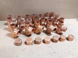 lot 753 image: Lot of (28) 1-12 Copper Reducing Tees & Caps - Lot Weighs about 11 LBS