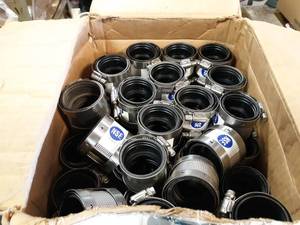 lot 784 image: NEW Box Lot of (70) No-Hub 1-12 Stainless Steel Clamps