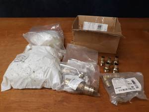 lot 827 image: Uponor 1-14 Brass ProPex Ball Valves, Brass Adapters & (70) ProPex 1 Rings w Stops