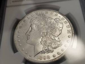 lot 01 image: 1898-O MORGAN SILVER DOLLAR MS64 NGC