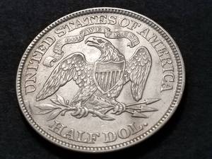 lot 22 image: 1869 US SEATED LIBERTY HALF DOLLAR IN HIGH GRADE