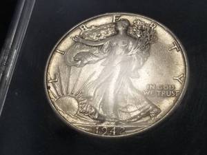 lot 53 image: 1942 WALKING LIBERTY HALF DOLLAR