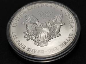 lot 56 image: 1991 AMERICAN SILVER EAGLE 1 TROY OZ. .999 FINE SILVER IN AIRTITE