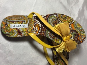lot 94 image: Sandal Set with Character
