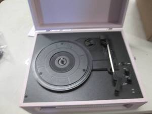 lot 4 image: crosley voyager turnrable powers on...