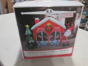 lot 15 image: animated santa and house inflateabl...