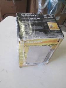 lot 56 image: lasko ceramic heater powers on ...