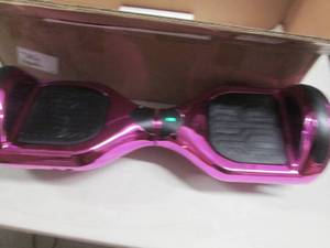 lot 65 image: purple hoverboard powers on plastic...
