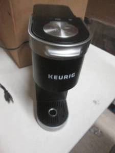 lot 72 image: black keurig powers on ...