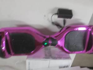 lot 103 image: purple hoverboard powers on ...