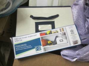 lot 209 image: box of hampers , and other cloth it...