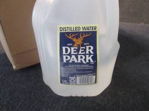 4 Gallons Distilled Water...