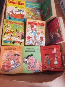 lot 13 image: Vintage Childrens Books featuring Walt Disneys Mickey Mouse, Walter Lantzs Woody Woodpecker and Modern Promotions The Flintstones