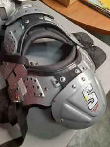 lot 15 image: Lot of 2 Youth Football Shoulder Pads. Schutt Y Flex size Small and Battle Gear Tag Pro40 size Large