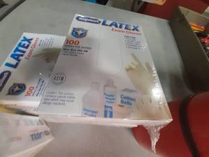 lot 18 image: 6 Boxes of Latex Exam Gloves One size fits Most, 100 gloves per box