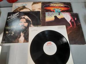 lot 41 image: Vintage Record Albums with Artists such as STYX, Boston & Bob Seger