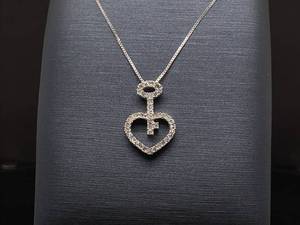 lot 42 image: Brand New 15 Carat Diamond Key Through Heart Pendant Set in 14k White Gold $1,375 Retail VIDEO