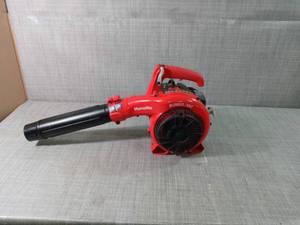 lot 84 image: 150 MPH 400 CFM 26cc Gas Handheld Blower Vacuum by Homelite- used