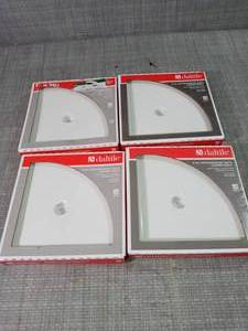 lot 97 image: Restore 8 in. W Resin Wall Mounted Corner Shower Shelf Tile in White by Daltile- set of 4 not used