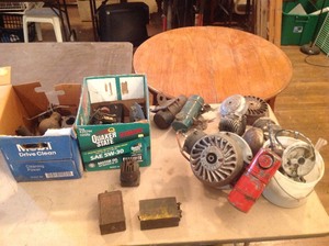 lot 15 image: Vintage Engine Parts & Tanks