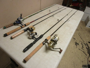 lot 716 image: ASSRTD. FISHING POLES W REELS
