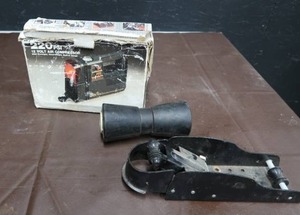 lot 54 image: AIR COMPESSOR WITH HITCH AND BOAT ROLLER