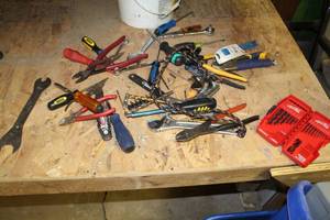 lot 1079 image: Hand Tools (in bucket)  with Box Cutters, Pliers, Drill Bits, Screwdrivers, Crescent Wrench, Locking Pliers, Ratchets, Misc. Hand Tools