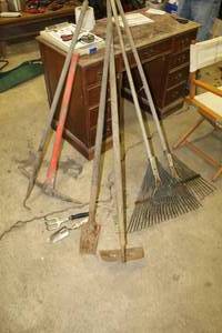 lot 1143 image: Lot of (Approximately 8) Yard Tools  with Leaf Rakes, Pickaxe, Small Shovel, Hoe, Small Hand Tools
