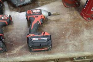 lot 1610 image: Milwaukee 18V Cordless Impact Wrench 14 Hex  2656-20  with M18 Red Lithium Battery