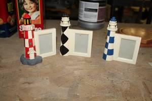 lot 1671 image: Lot of (3) Lighthouse Picture Frame Table Dcor