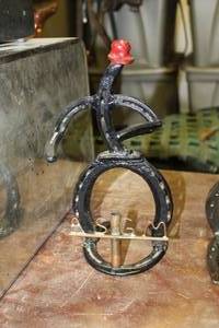 lot 1667 image: Handmade Metal ASGM Horseshoe Figurine 12H