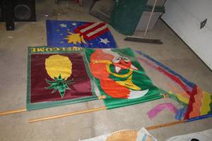 lot 1682 image: Lot of (4) Decorative Flags  with Rainbow, Pineapple, Fox, Firecracker