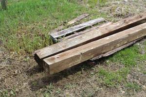 lot 1007 image: Lot of (2) Wood Posts 8Lx6Tx6W