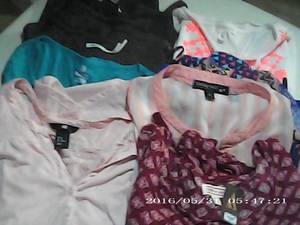 8 womens tops size M...