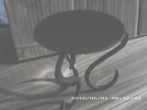 6 wrought iron candle holders...