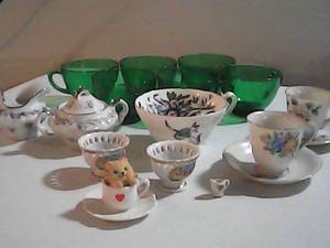 6 green glass cups, 3 teacups with saucers, 1 teacup made in japan, and more.