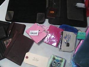 Lot of billfolds, picture holders, ...