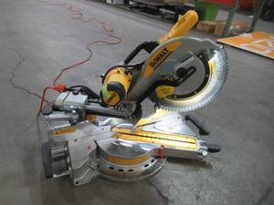 lot 50 image: Dewalt 15 Amp 12 in. Double Bevel Sliding Compound Miter Saw DWS780