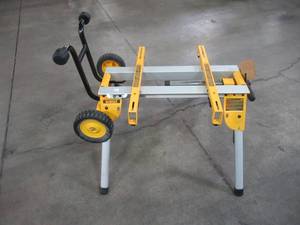 lot 51 image: Dewalt Heavy Duty Rolling Table Saw Stand DW7440RS