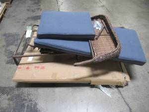 lot 210 image: Hampton Bay Cambridge Brown Wicker Outdoor Patio Chaise Lounge with CushionGuard Sky Blue Cushions H039-01196400