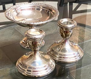 lot 21 image: Pair of Weighted Sterling Candle Holders and Candy Dish