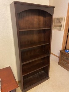 lot 85 image: Tall Dark Wood Bookshelf