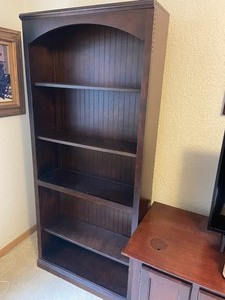 lot 86 image: Tall Dark Wooden Bookshelf