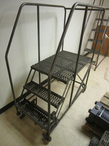 lot 543 image: ROLLING STAIRCASE