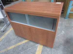 HAWORTH STORAGE CABINET WITH SLIDING GLASS DOORS