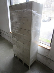 FREESTANDING BANK OF LIKE NEW METAL LOCKERS