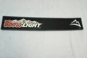 lot 46 image: Coors beer bar mat