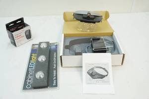 lot 94 image: cabinet light,magifiny head band, electric converter